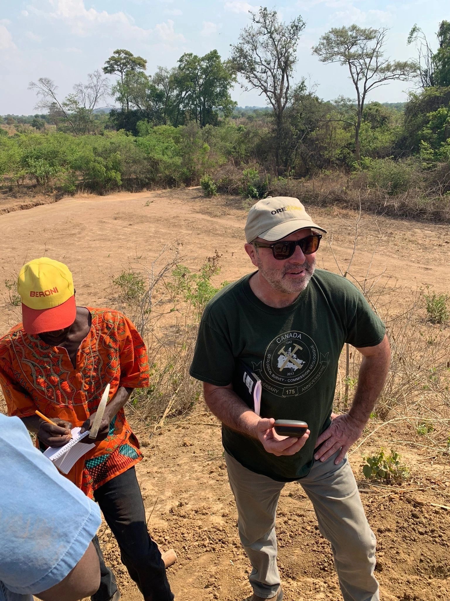 Geologists logging samples in the field at Shangwe